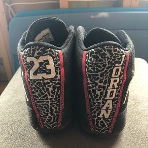 Air Jordan 29. Black and red gym shoe.